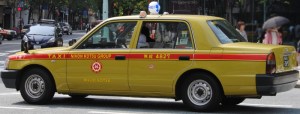 A typical Japanese taxi cab. Public domain photograph from Wikimedia Commons.